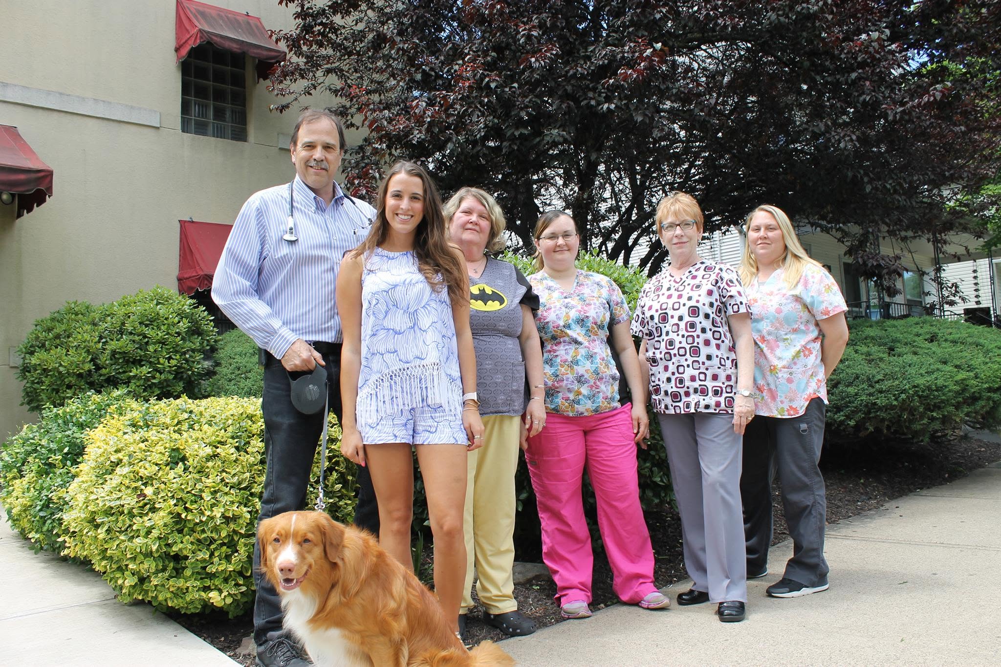 Dr. Stanley A. Lobitz, MD, with his daughter Karlie, Drake, and the practice staff outside the office at 155 East Bennett Street, Kingston, PA